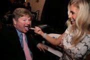 Nashville star Michelle Murray feeds frosting to Sam
